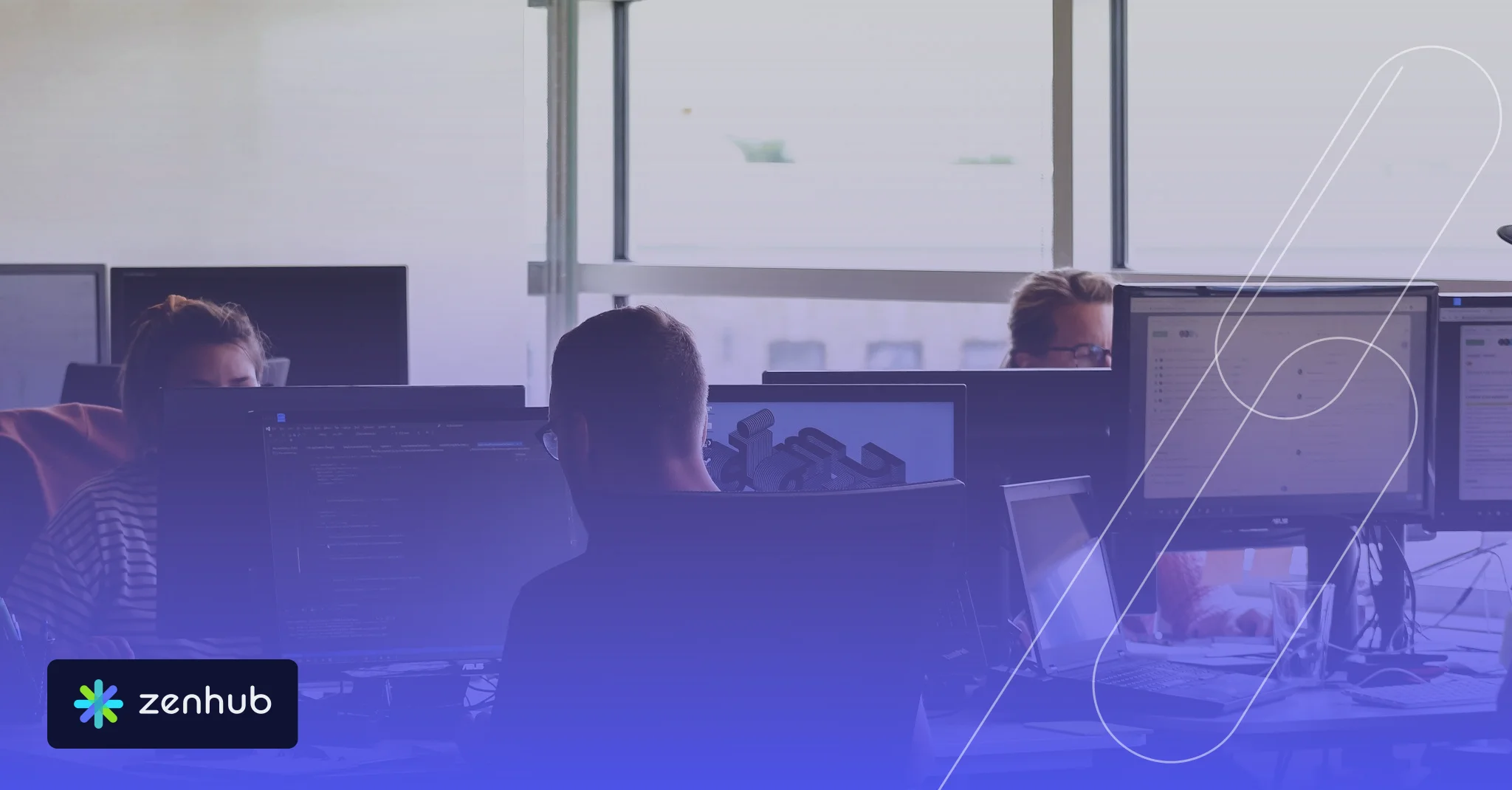 Developers working at desks with multiple monitors in an open office, with a blue Zenhub gradient