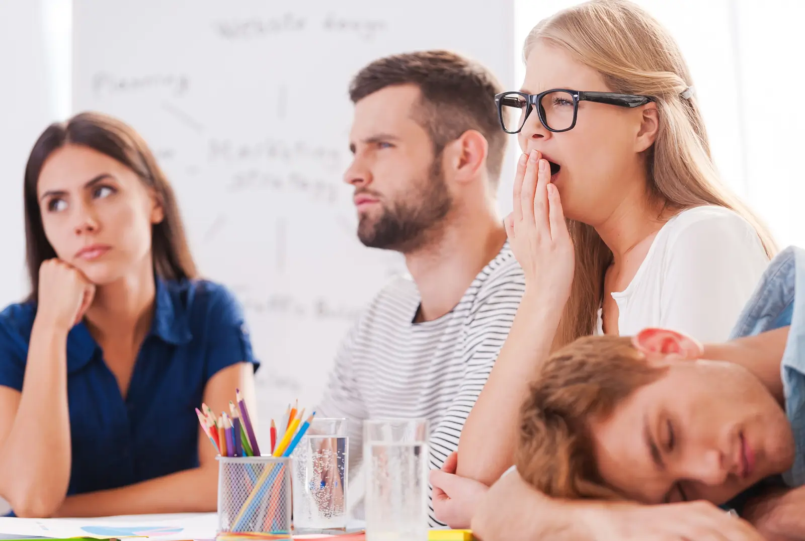 People bored in a meeting